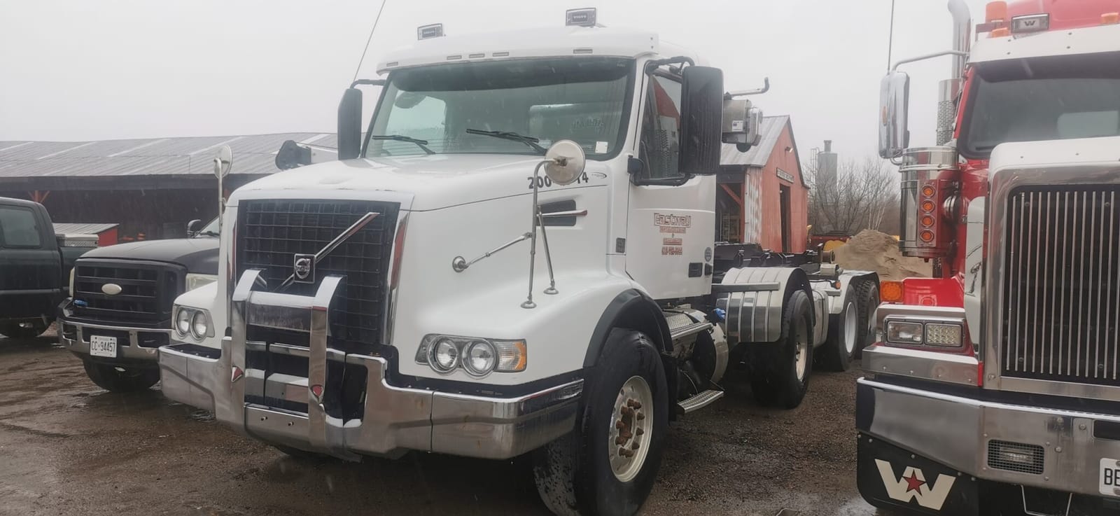 2013 Volvo Tri Axle Hook Truck